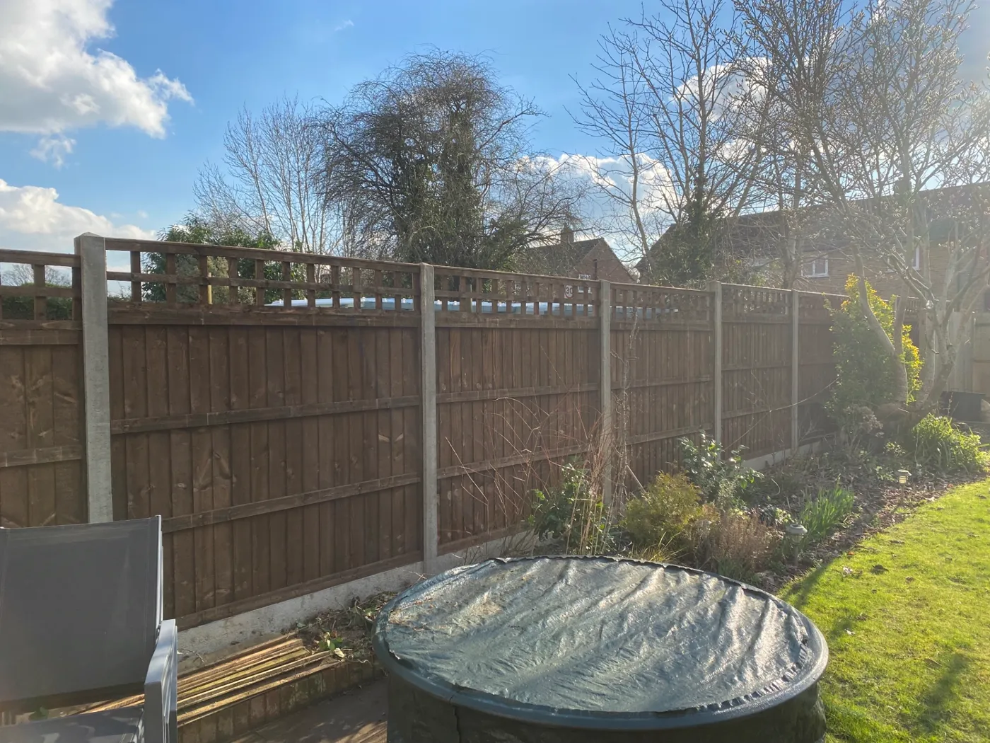 Trellis topped fence panels installed for added privacy in a residential garden